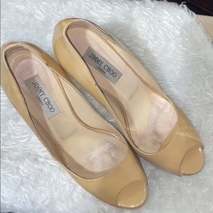 Authentic Jimmy Choo nude leather crown peep toe.